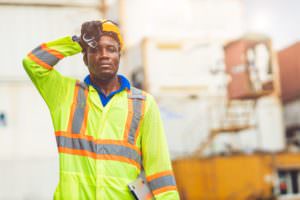 industrial worker suffering from heat-related illness